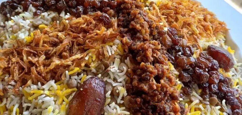 طرز تهیه عدس پلو مجلسی بدون گوشت با کشمش و خرما